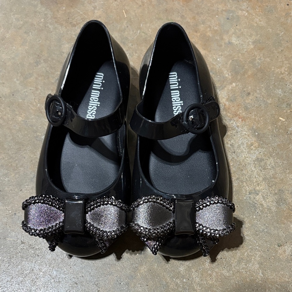 Mini Melissa Glossy Black Dress Shoes with Sparkling Bow